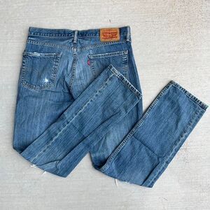 Levi’s 511 ripped blue jeans